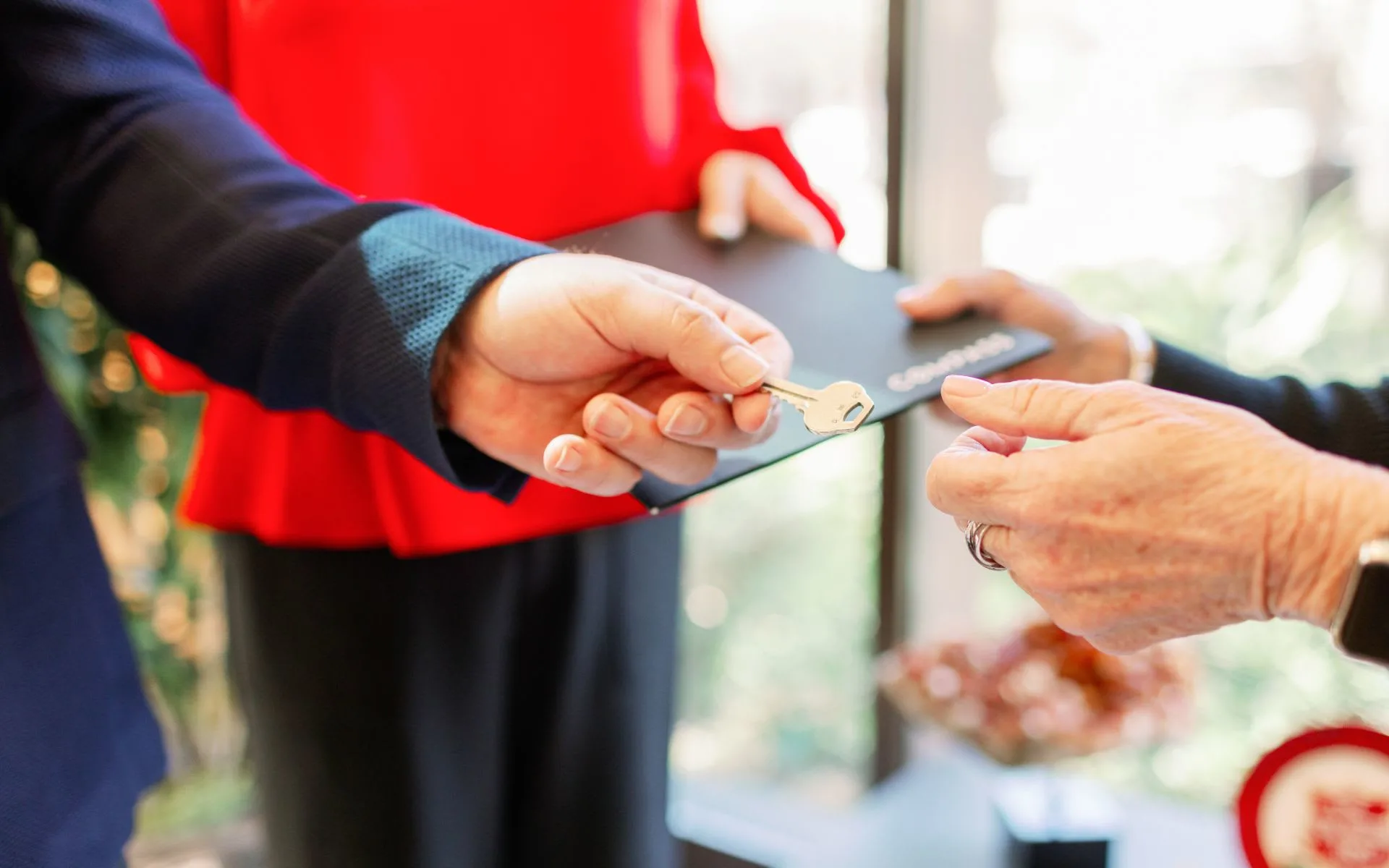 handing someone a key